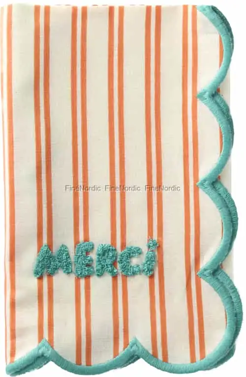 Rice Stoffserviette - Orange Streifen - Wellenkante und getuftetes grünes "MERCI"